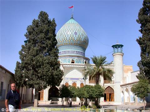 Tiled turquoise dome and minaret of the Shah-e Cheragh shrine, Shiraz