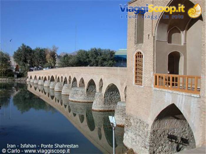 Shahrestan Bridge in Isfahan, brick arches reflected in Zayandeh river