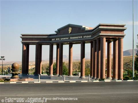 Pink marble colonnade at Independence Park, Ashgabat, under clear daylight
