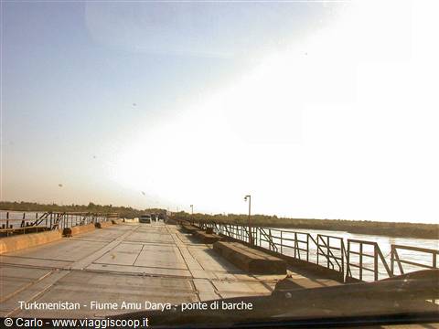 Pontoon bridge over the Amu Darya river, harsh light on metal