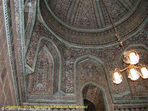 Khiva, inside Pahlavon Mahmud mausoleum, decorated dome and lamps