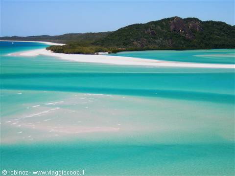 Whitehaven Beach: white sand and turquoise waters under green hills