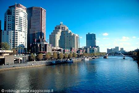 Skyscrapers along Melbourne's Yarra River, footbridge, daylight