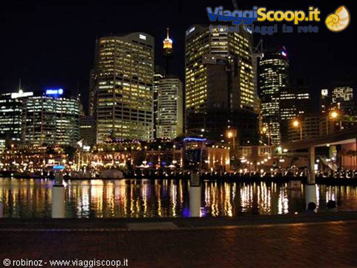 Darling Harbour at night: illuminated skyscrapers reflected in the bay water