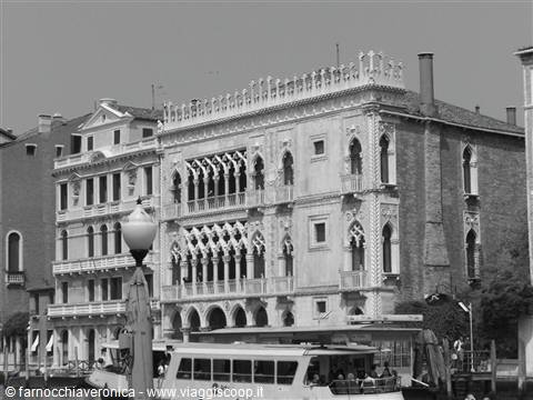 Ca' d'Oro palace on Venice Grand Canal, vaporetto docked nearby