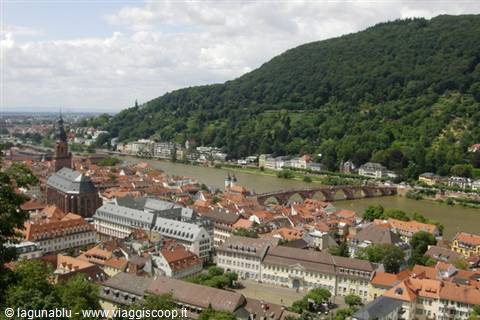 Heidelberg: red rooftops, the Neckar river and the Old Bridge beneath green hills