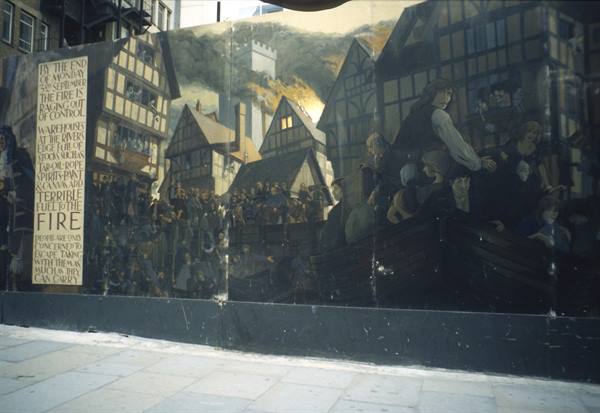 London mural depicting the 1666 Great Fire with burning Tudor timber-framed houses