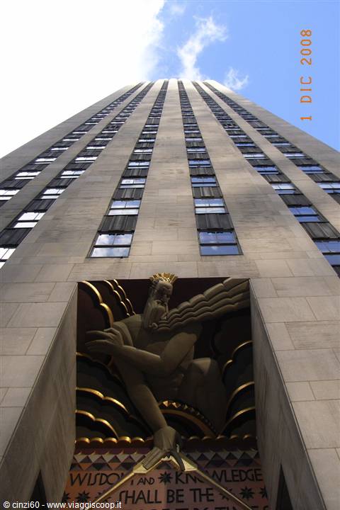 Golden Zeus relief on the limestone facade of Rockefeller Center, New York