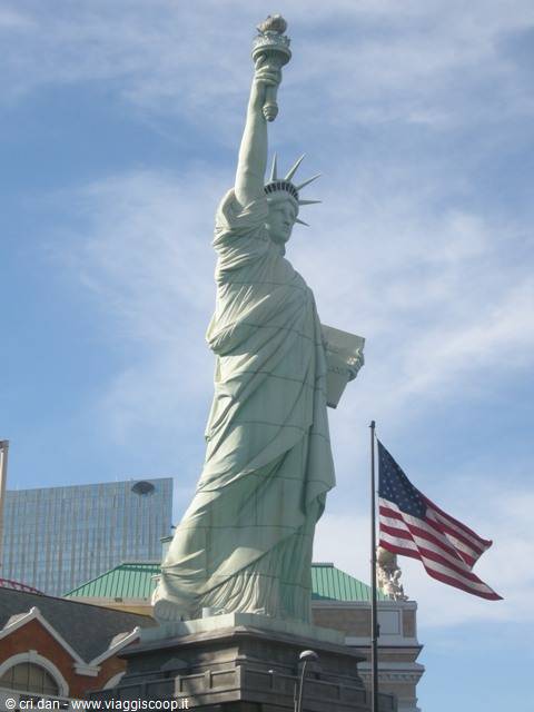Statue of Liberty replica in Las Vegas with American flag waving