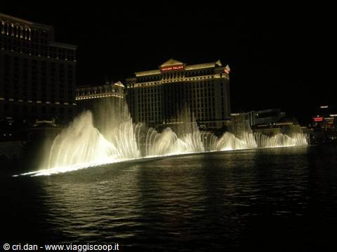 Illuminated fountains at night in front of Caesars Palace hotel, Las Vegas