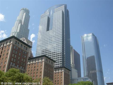 Glass and brick skyscrapers under the blue sky in downtown Los Angeles