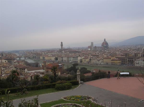 Piazzale Michelangelo, Florence: cathedral and tower over the Arno under grey sky