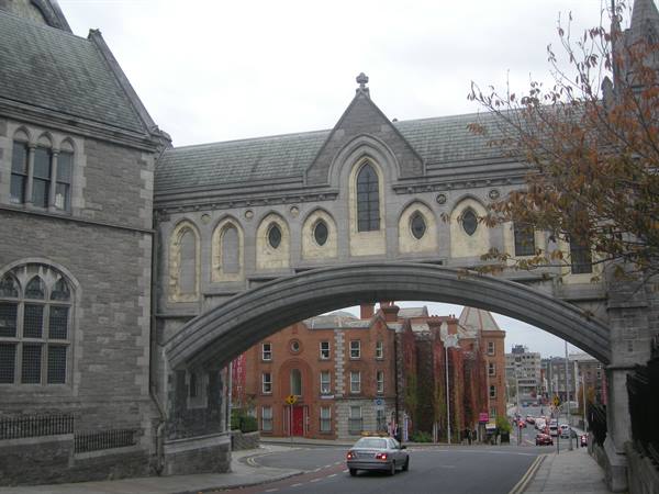 Stone covered footbridge with Gothic arches links Christ Church Cathedral in Dublin