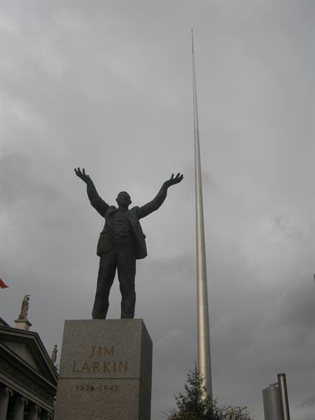 Jim Larkin statue with open arms in front of Dublin's Spire