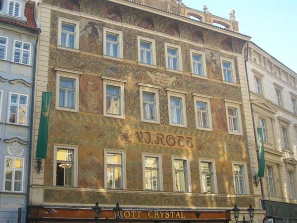 Rott building in Prague, facade covered with golden painted frescoes