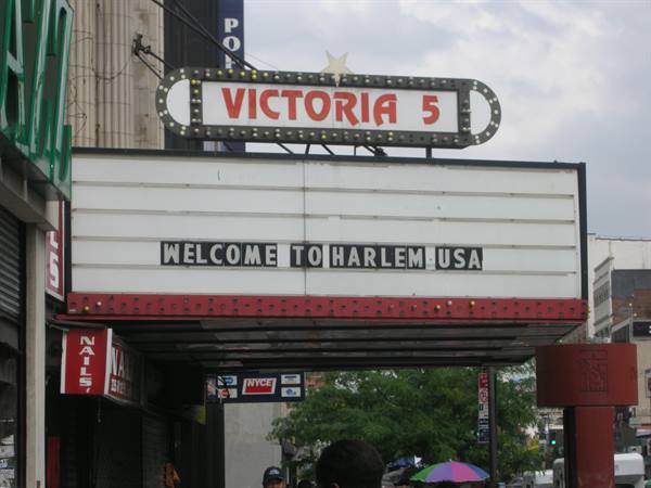 Victoria 5 marquee of the Apollo Theater in Harlem reading Welcome to Harlem USA