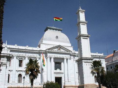 White Government Palace in La Paz with Bolivian flag and white column