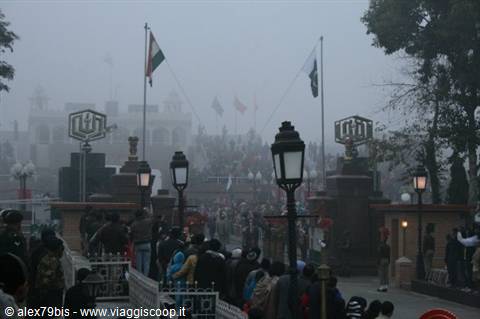 Flag-lowering ceremony at Wagah border, crowds in the fog
