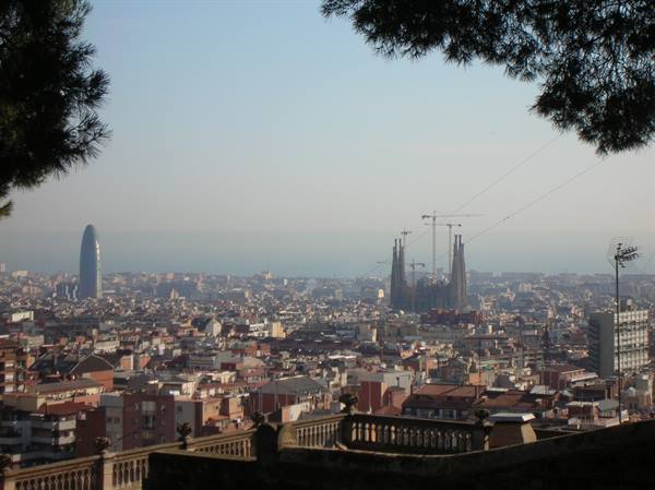 Sagrada Família and Torre Glòries among Barcelona rooftops from terrace