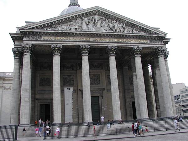 Facade of the Pantheon in Paris with Corinthian columns and tourists on the steps