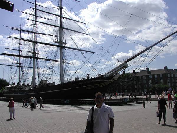 Man in front of the Cutty Sark clipper ship, Greenwich