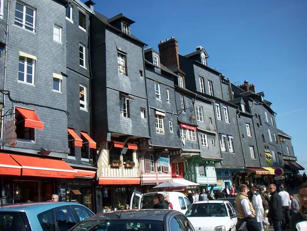 Slate-faced houses with steep roofs along the Mont-Saint-Michel street