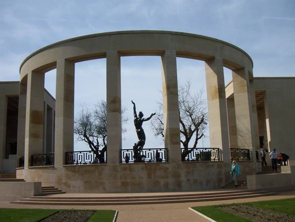 Bronze Spirit of American Youth statue inside the circular stone memorial, Normandy American Cemetery