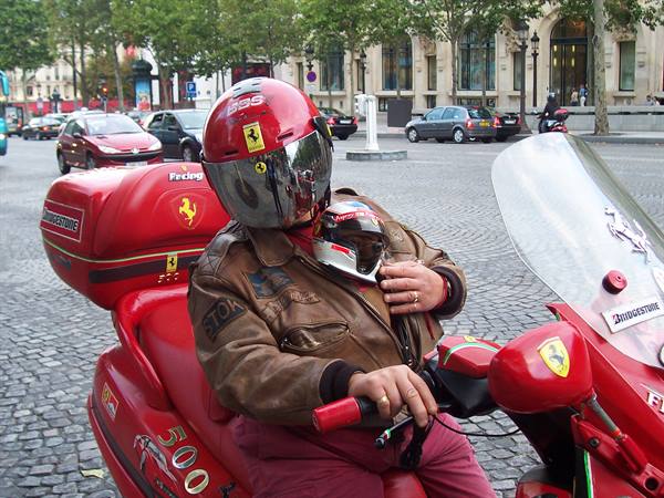 Parisian motorcyclist with passenger....
