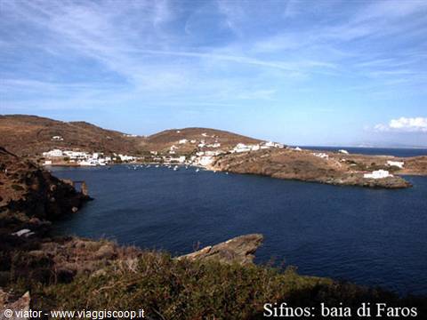 Faros bay in Sifnos: blue water between arid hills and white houses
