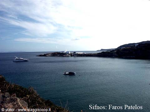 Faros Patelos bay in Sifnos, boat and yacht on blue sea between arid hills