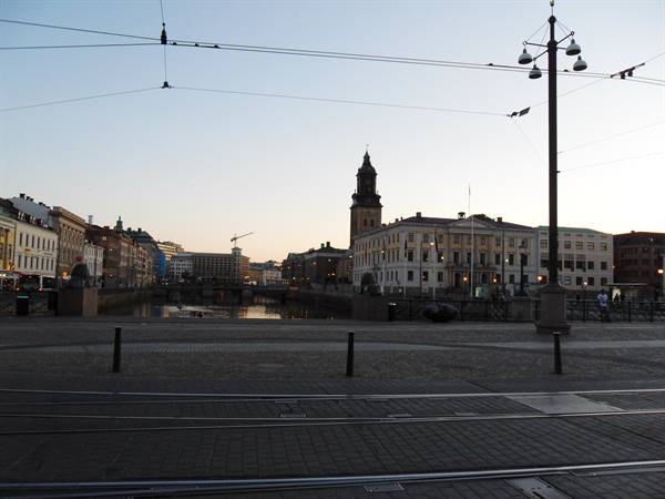 Tram tracks on the square, canal and German church tower in Gothenburg