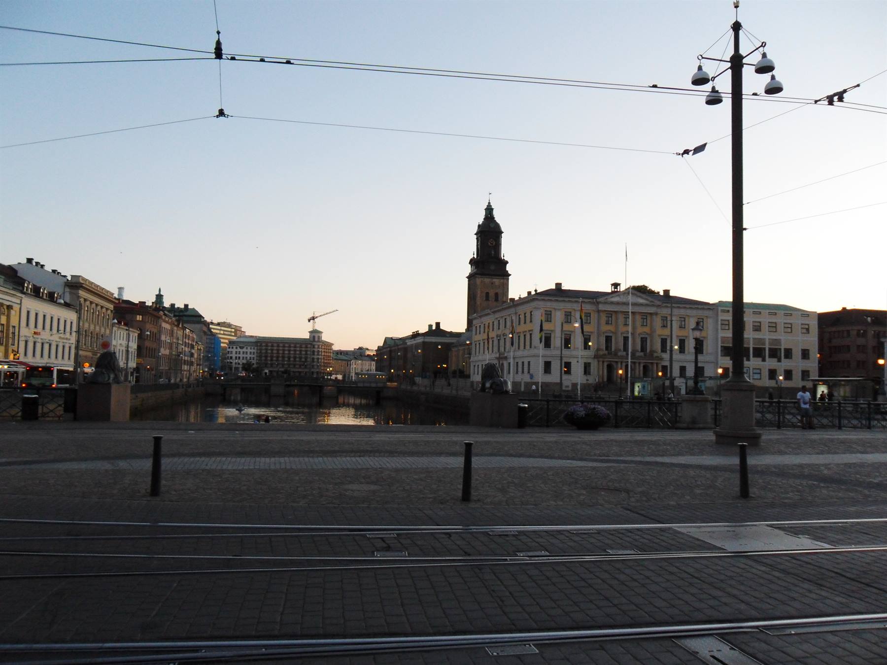 Tram tracks on the square, canal and German church tower in Gothenburg