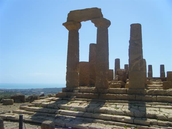 Stone columns of the Temple of Hera at Agrigento's Valley of the Temples, sea behind
