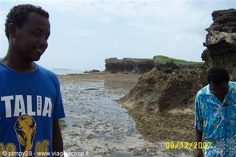 Kassim the best beach boy ( left)