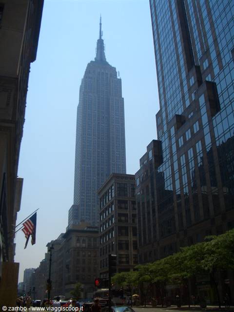 The Empire State Building rises among Manhattan's glass skyscrapers