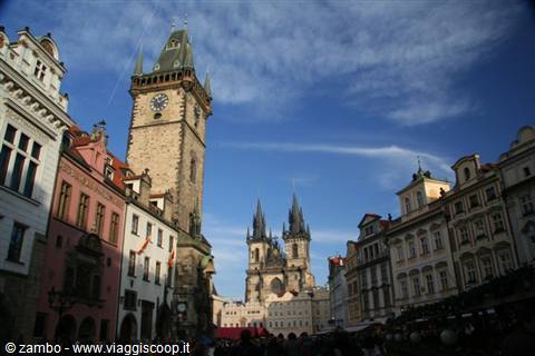 Clock tower and Týn Church overlooking Prague's Old Town Square