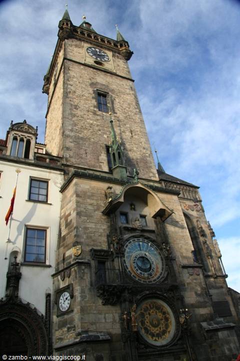Old Town Hall tower with astronomical clock, gothic stone and cloudy sky in Prague