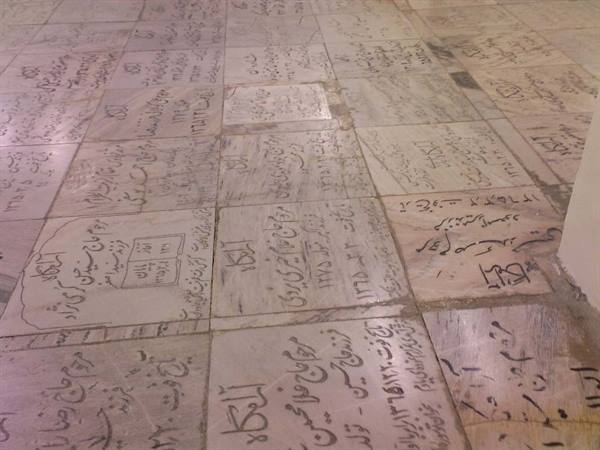 Marble tiles engraved with visitors' inscriptions and signatures, Mashad