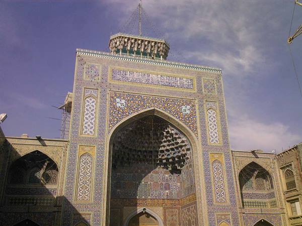 Iwan portal of Shah Mosque in Esfahan, muqarns and blue tiles