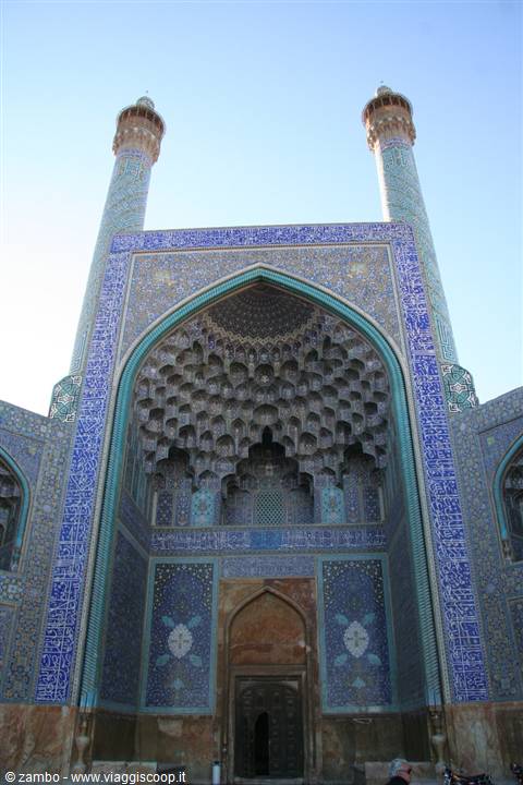 Tiled portal with muqarnas and minarets of Shah Mosque, Esfahan