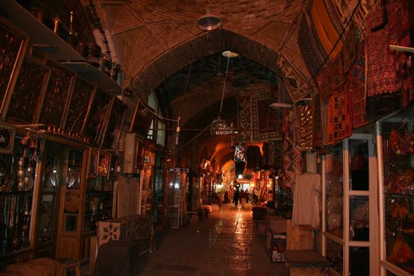 Esfahan bazaar, brick vaults and lit craft shops along the passage