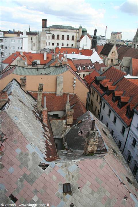 Old damaged rooftops over Bratislava city buildings in daylight