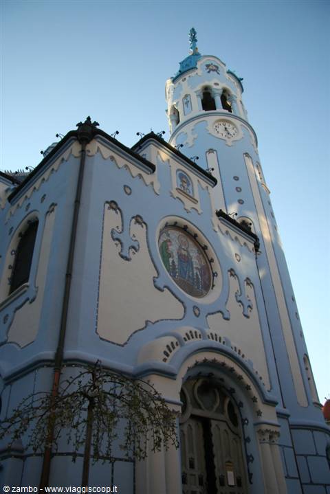 Blue Church facade with clock tower and mosaic, Bratislava