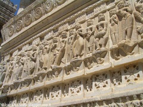 Carved marble frieze of dancing figures on Ranakpur Jain temple wall