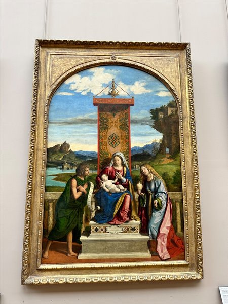 In front of an ancient Madonna and Child, time seems to have stood still.