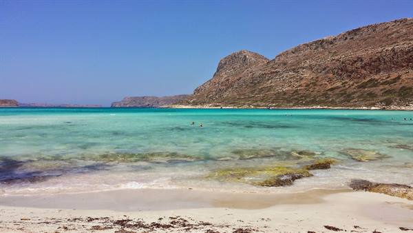 A dip in the turquoise waters of Balos, under the Cretan sun.