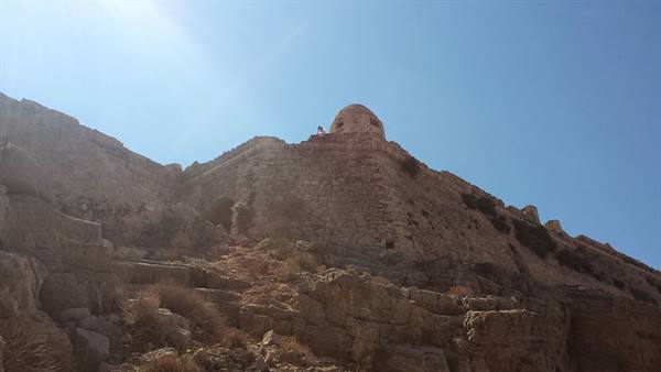 Under the summer sun, exploring the ancient Venetian fortress on top of the rock.