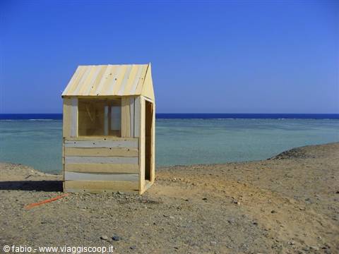 lookout post in the blue of the sea