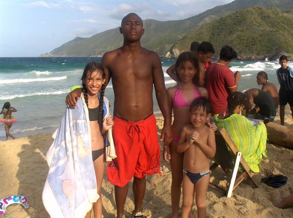my children with musicians on the beach of Choroní