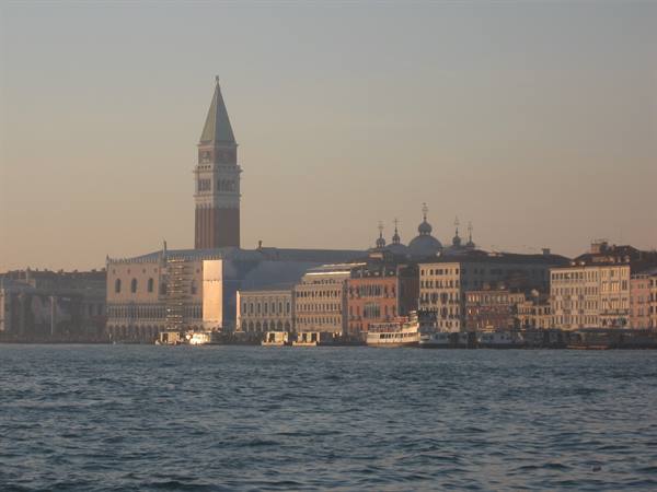 St Mark's Campanile and Doge's Palace across the lagoon water, Venice
